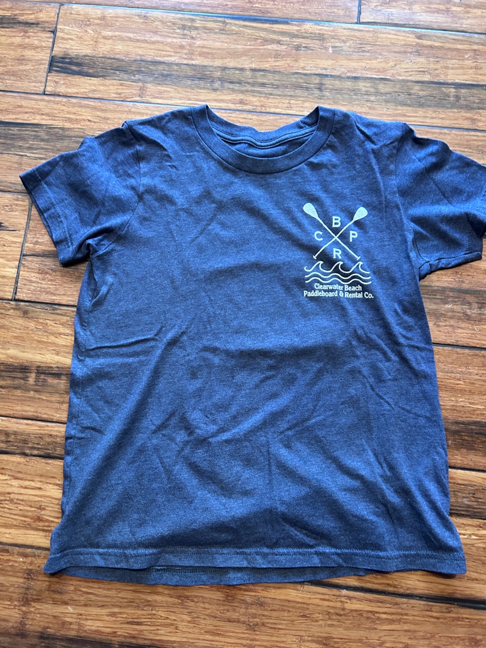 Clearwater Beach Paddleboard & Rental Co. T-shirt. Youth S/no tag. Heather Navy.